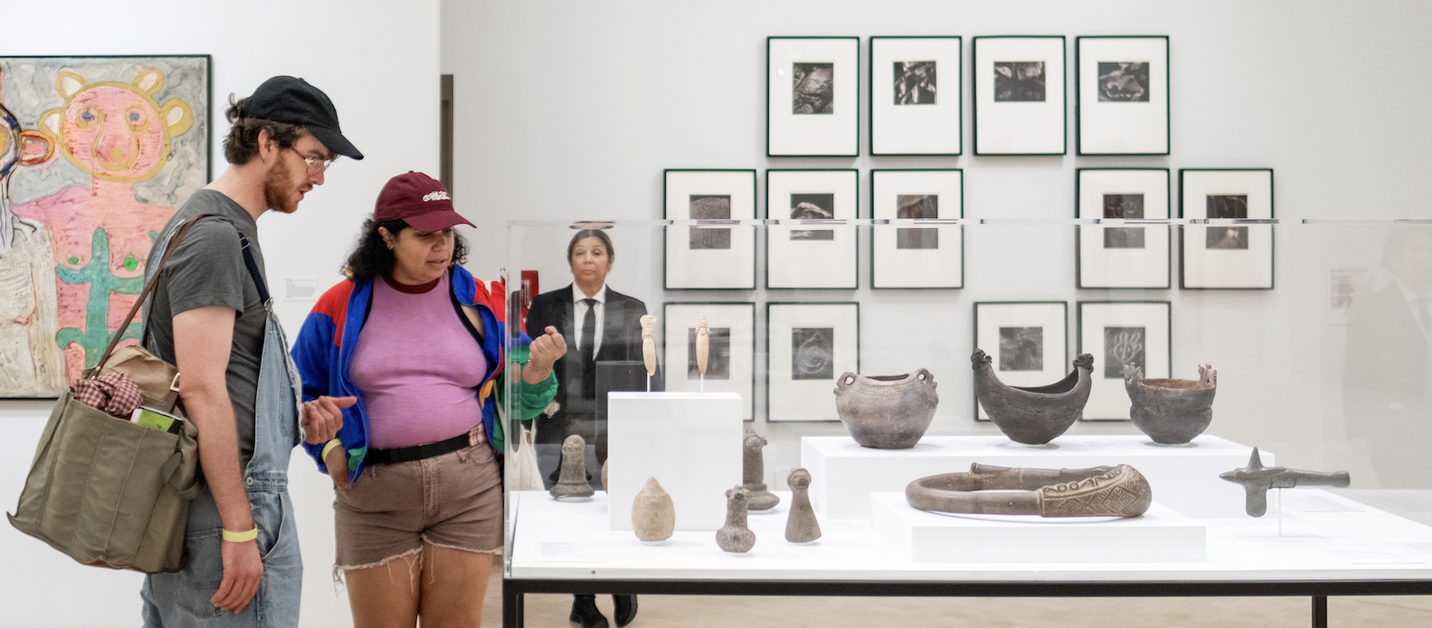 People visiting El Museo's exhibition