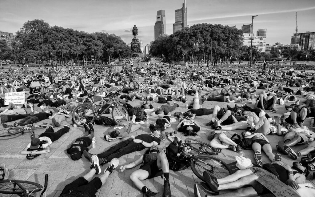 Protesters lying silently on the ground at the Philadelphia Art Museum for 8 minutes and 46 seconds, the amount of time a Minnesota police officer knelt on George Floyd's neck