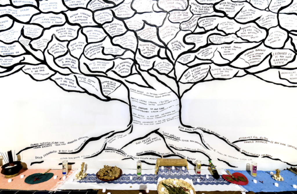 exhibition taking the form of a family tree recording the names of environmental activists murdered in recent years