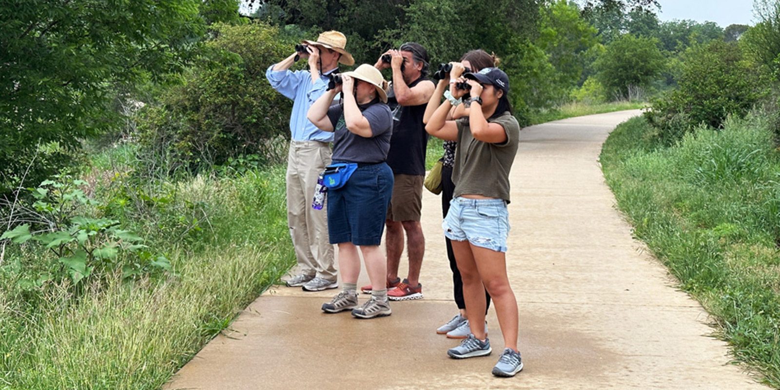 People with binoculars